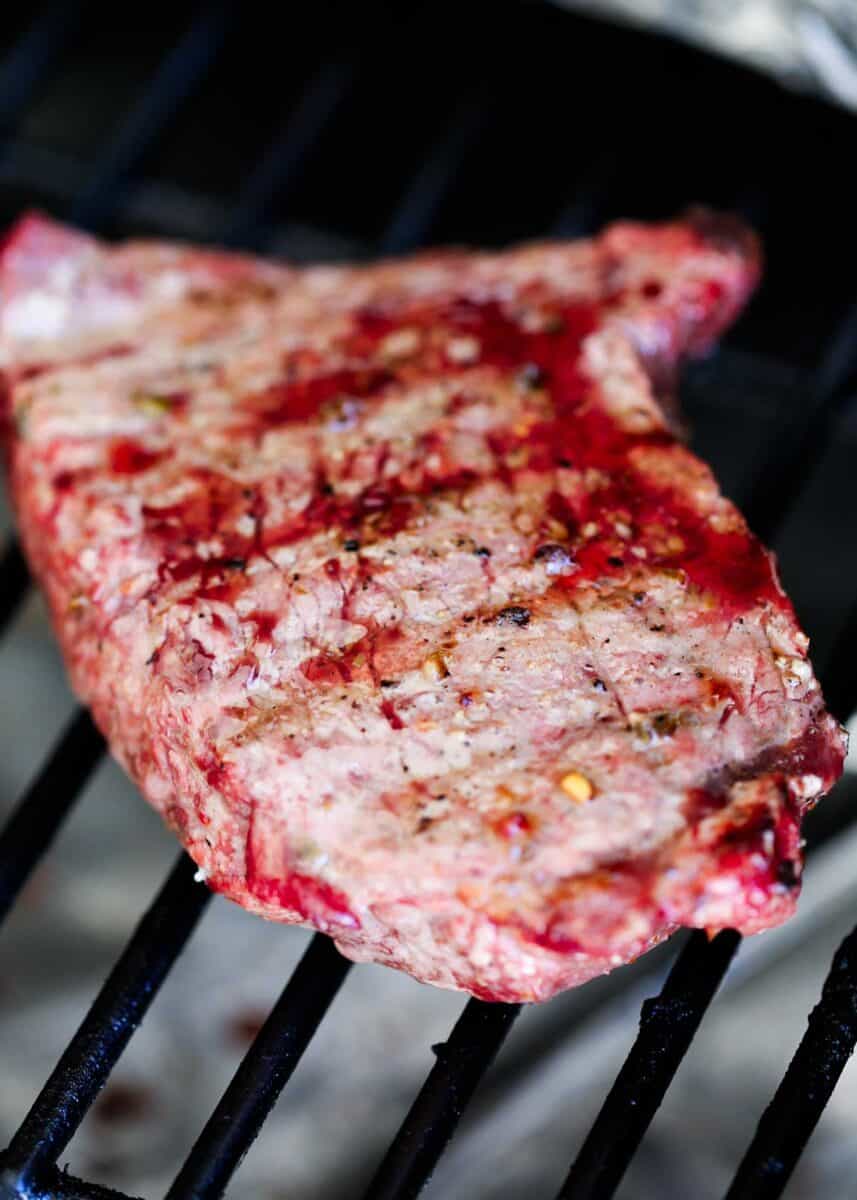 Showing how to cook sirloin steak on the grill.