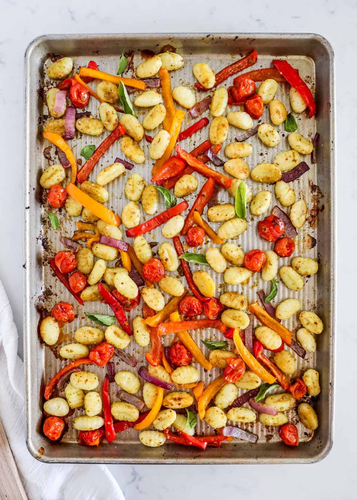 Gnocchi cooked on a sheet pan. 