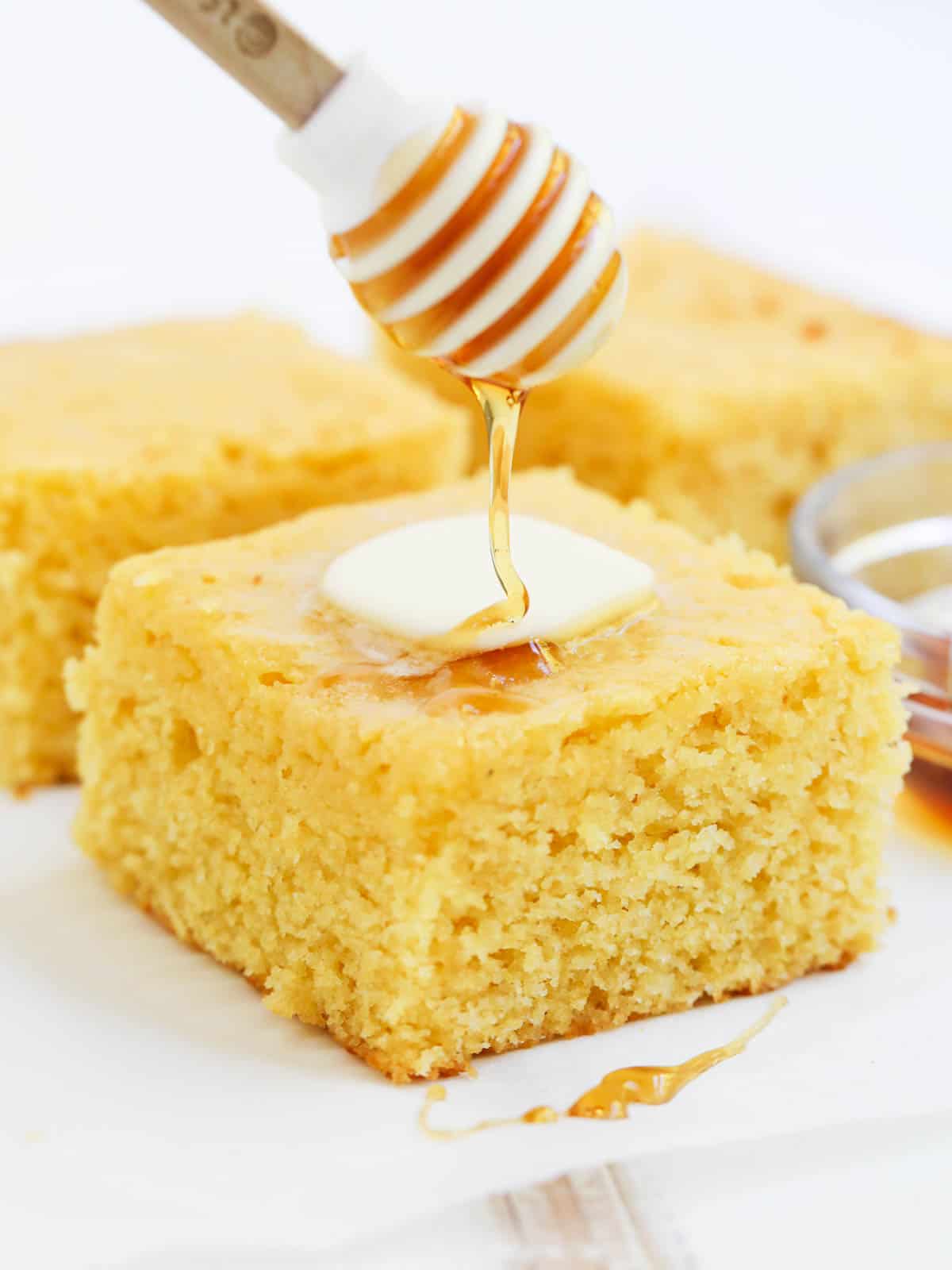 Sweet cornbread with honey drizzled on top. 