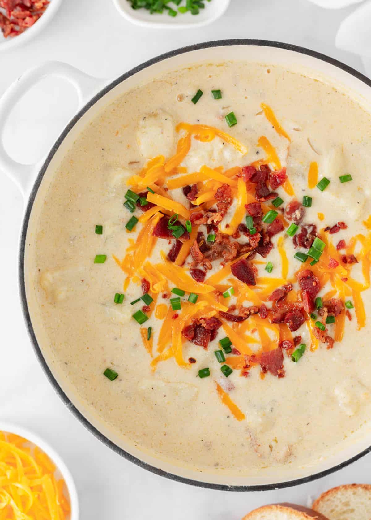 Baked potato soup in a pot.