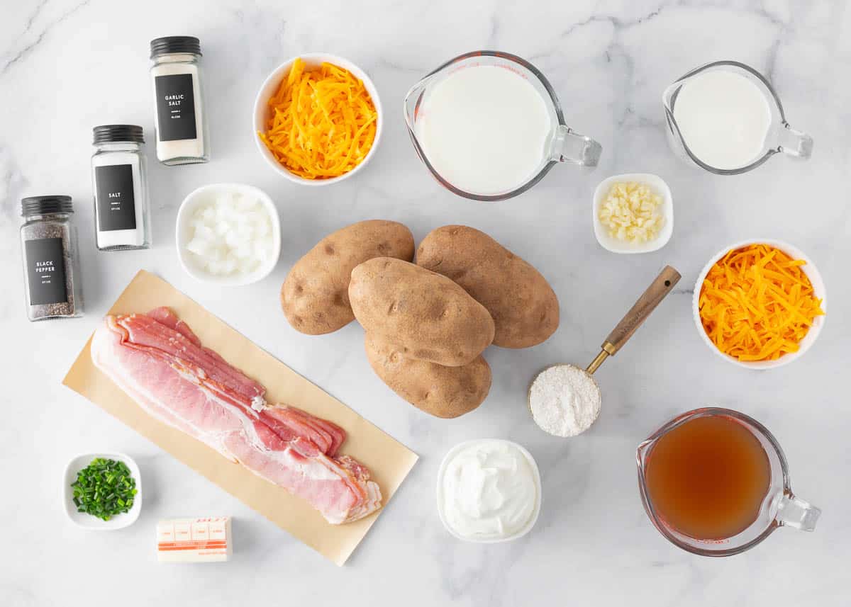 Baked potato soup ingredients on counter.