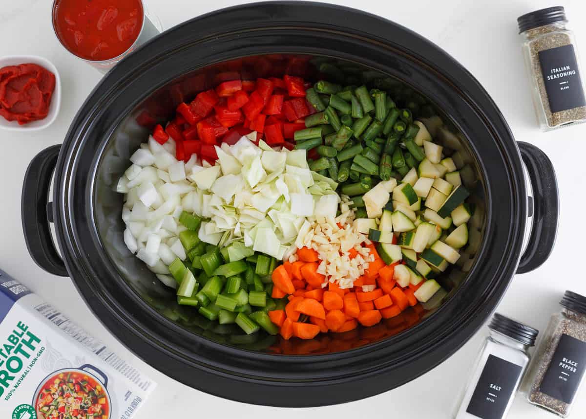 Cabbage soup ingredients in a crockpot.