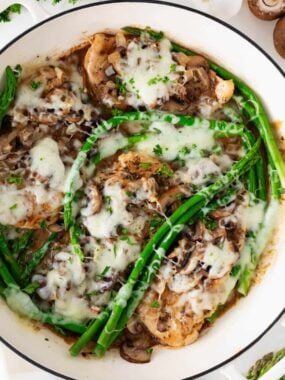 Cheesecake Factory&ndash;inspired chicken Madeira with mushrooms and asparagus cooked in a creamy wine sauce.