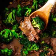 Beef and broccoli cooking in the crockpot.