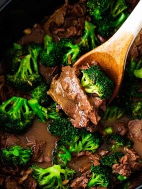 Beef and broccoli cooking in the crockpot.