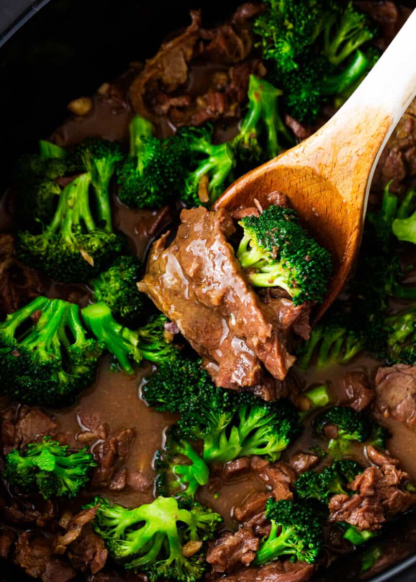 Beef and broccoli cooking in the crockpot.