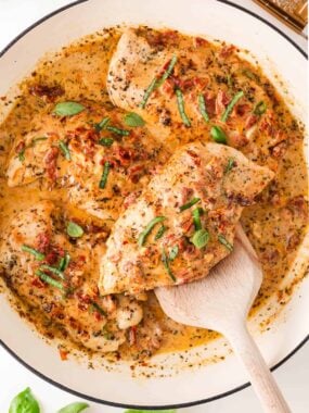 Marry me chicken cooked in a skillet.