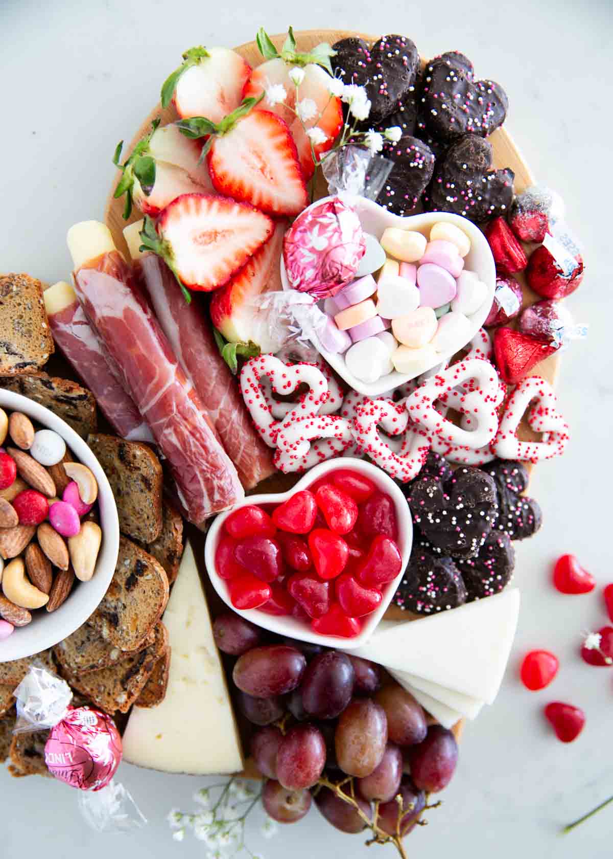 Valentine charcuterie board on counter.