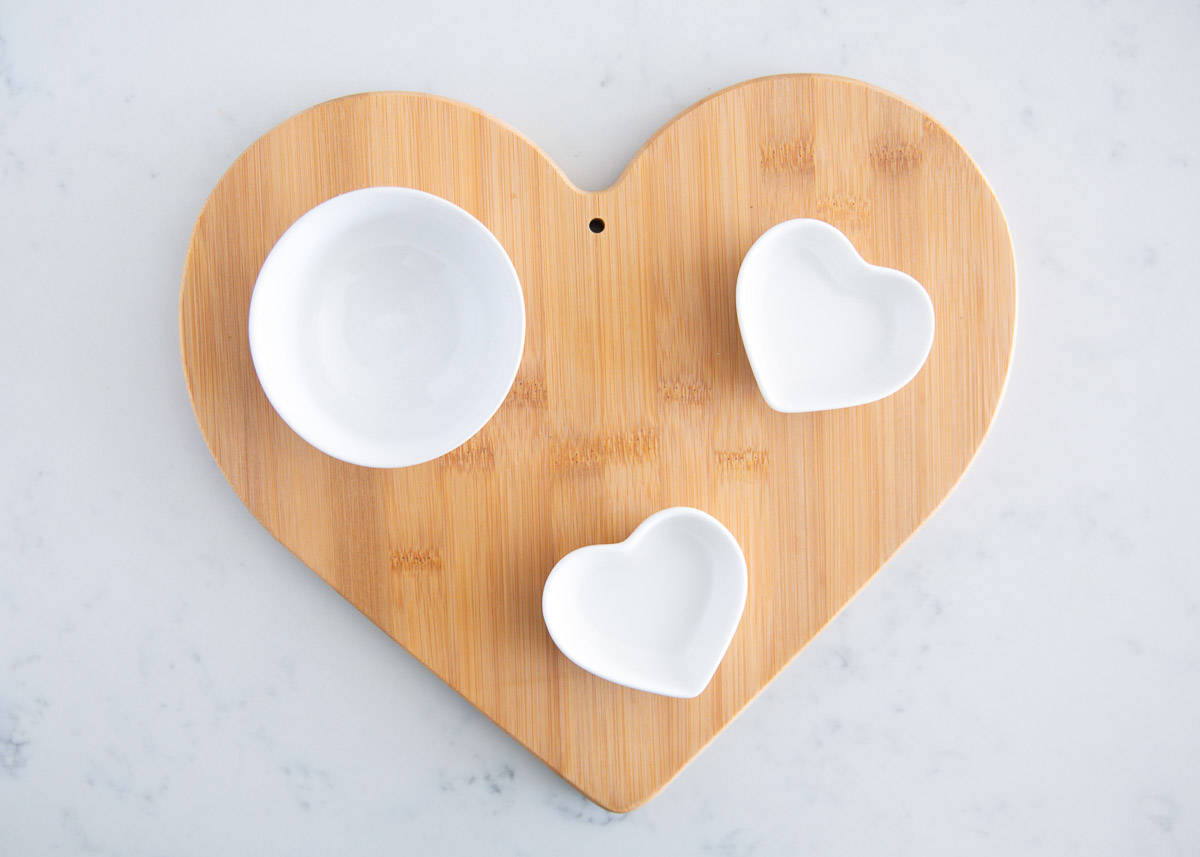 Bowls on wooden board.