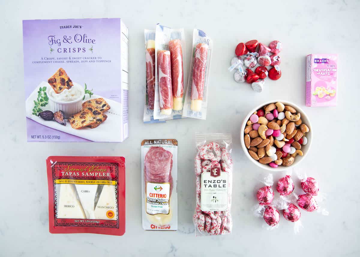 Valentine's Day charcuterie ingredients on counter.