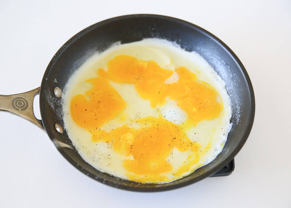 Cooking eggs in a pan. 