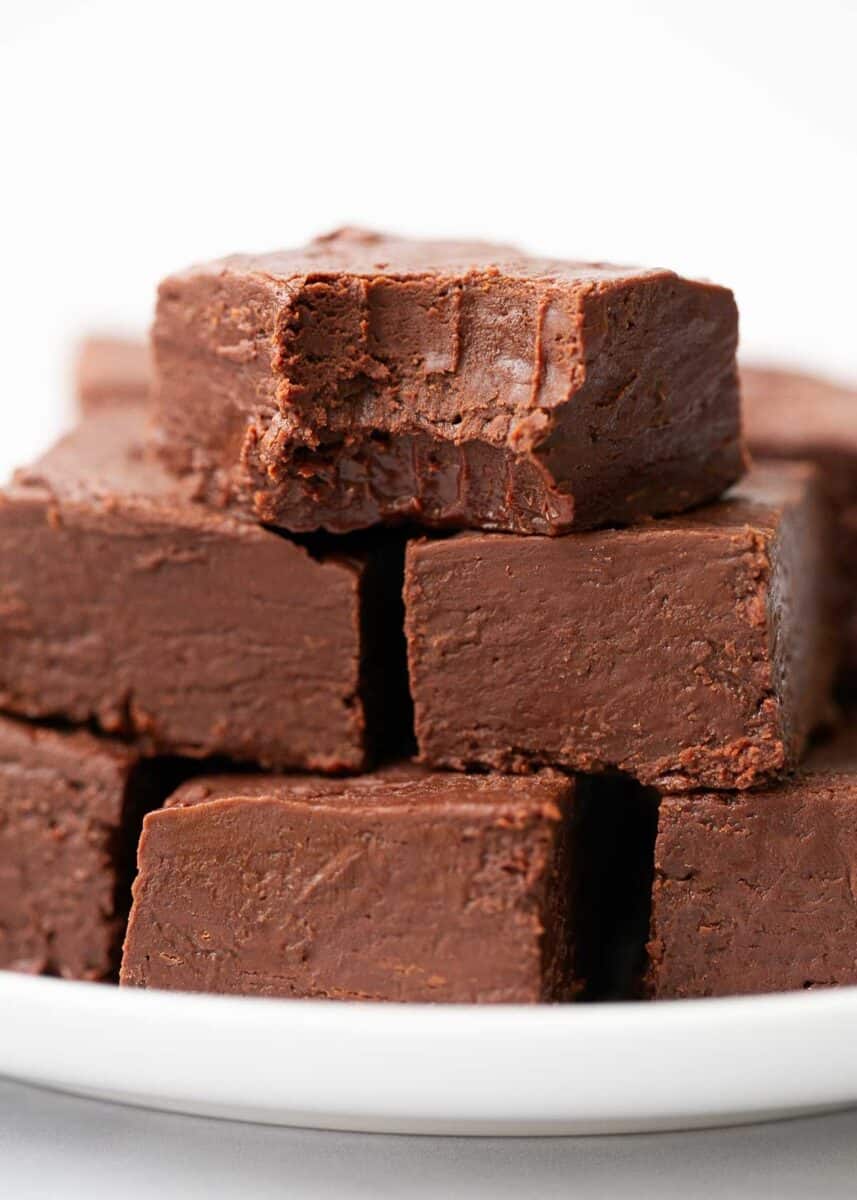 Stacked 3-ingredient chocolate fudge on plate.