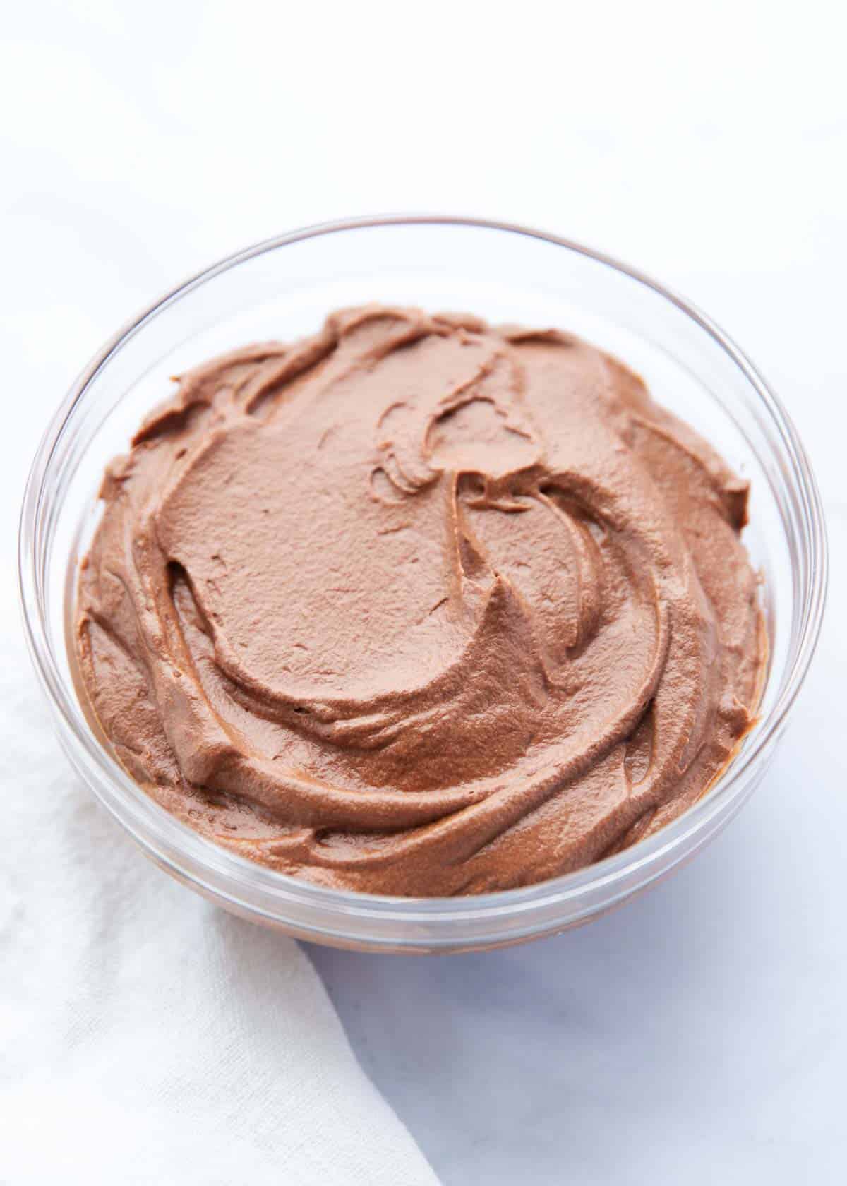 Chocolate mousse in a glass bowl.