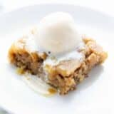 Apple cake on a white plate.