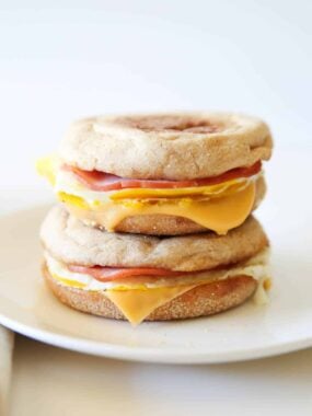 Egg mcmuffins on a plate.