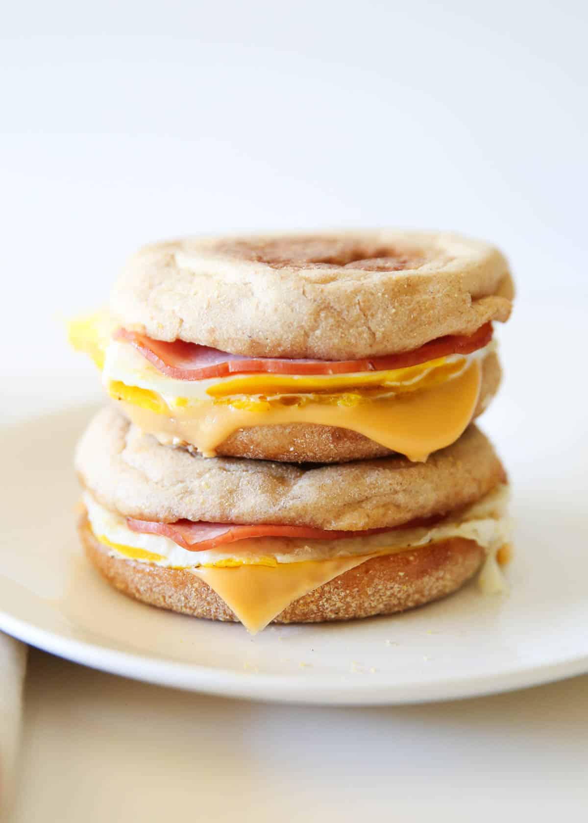 Egg mcmuffins on a plate.