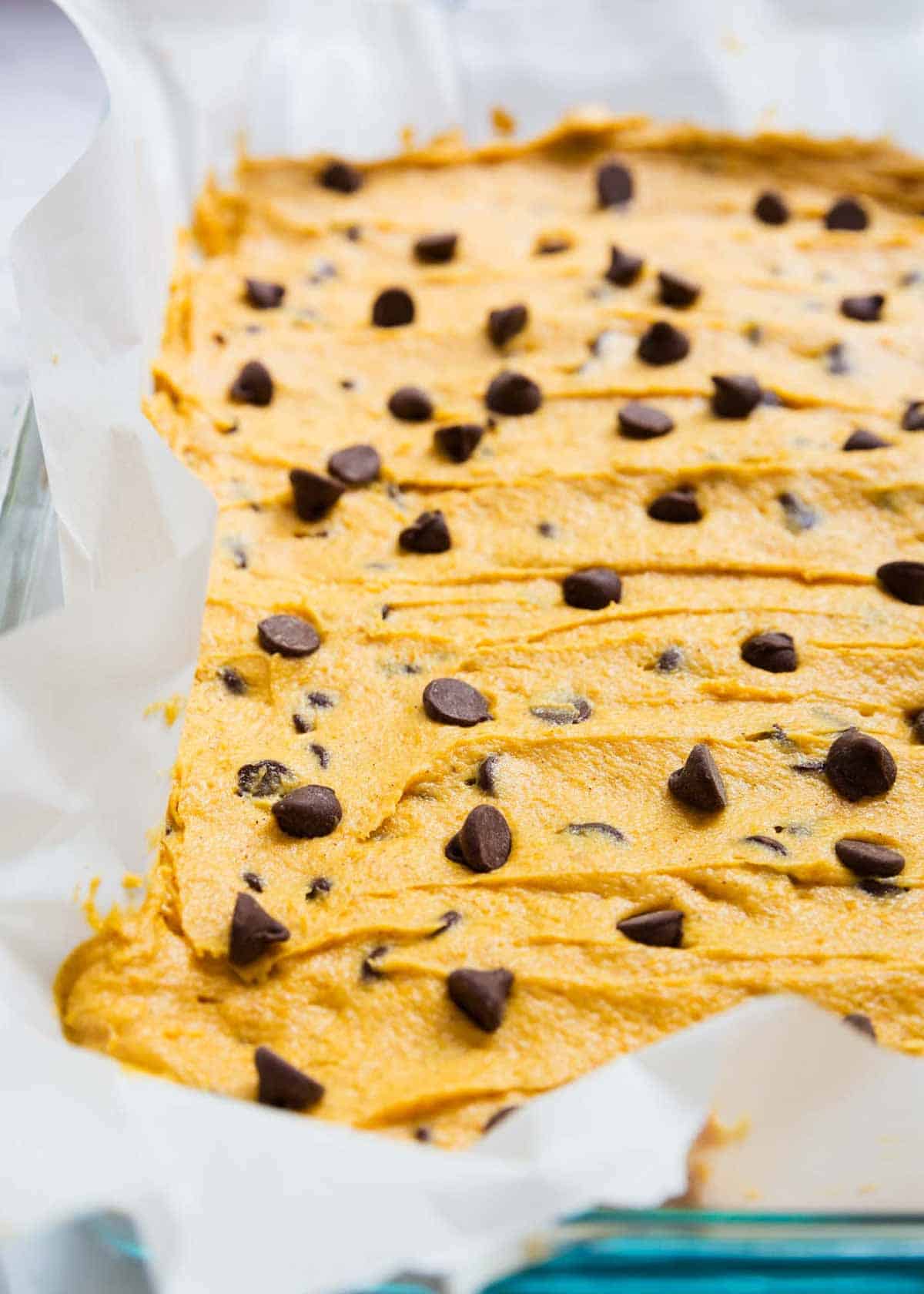 Pumpkin blondies batter in a pan. 