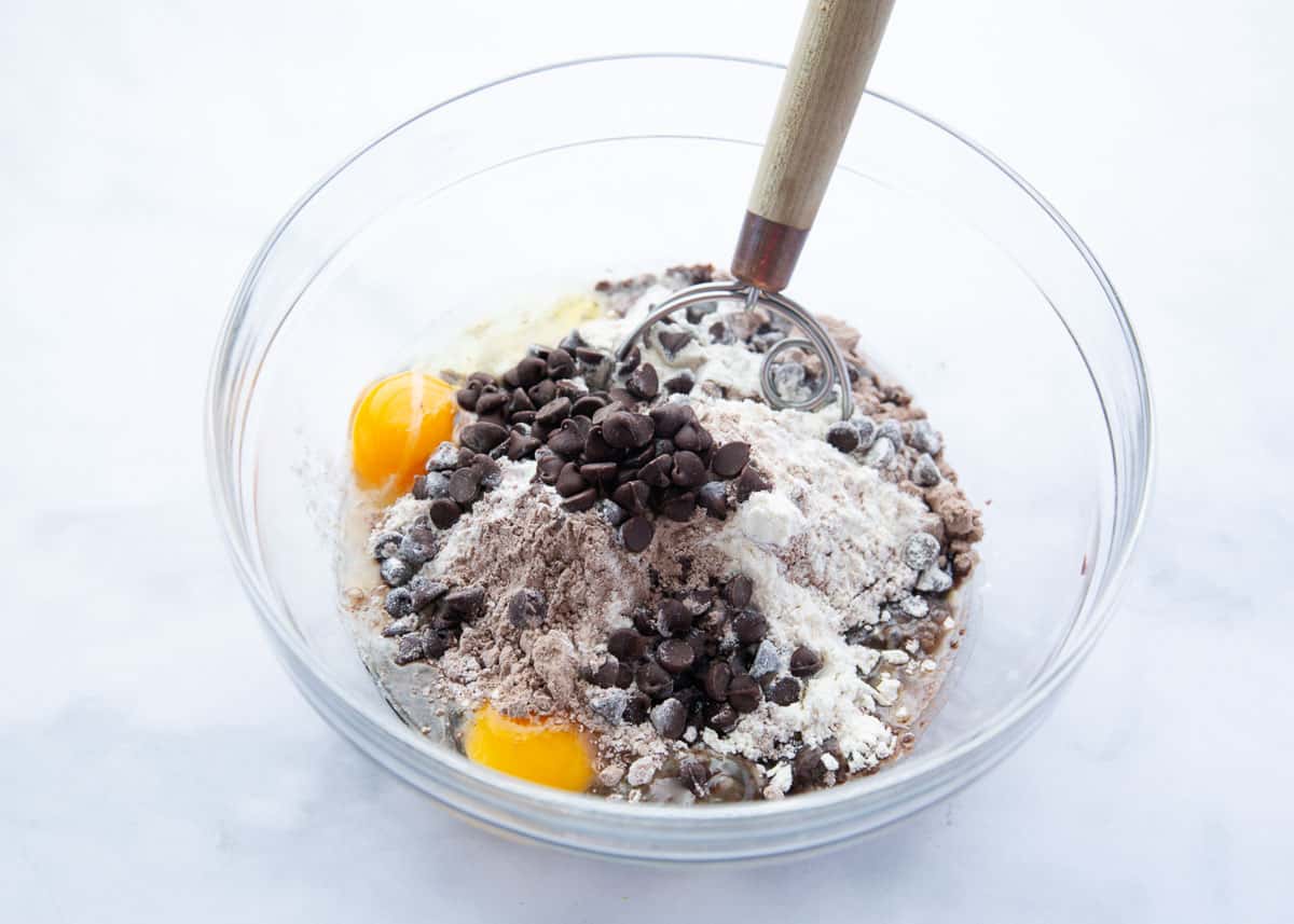 Brownie mix cookie ingredients in a bowl.