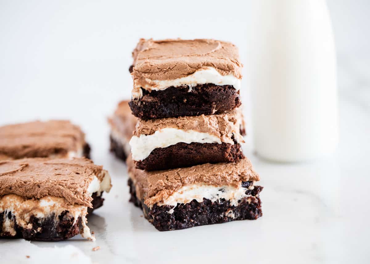 Marshmallow brownies stacked on top of each other. 