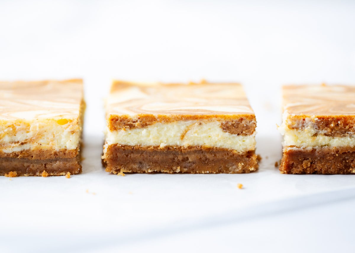 Sliced pumpkin cheesecake bars.