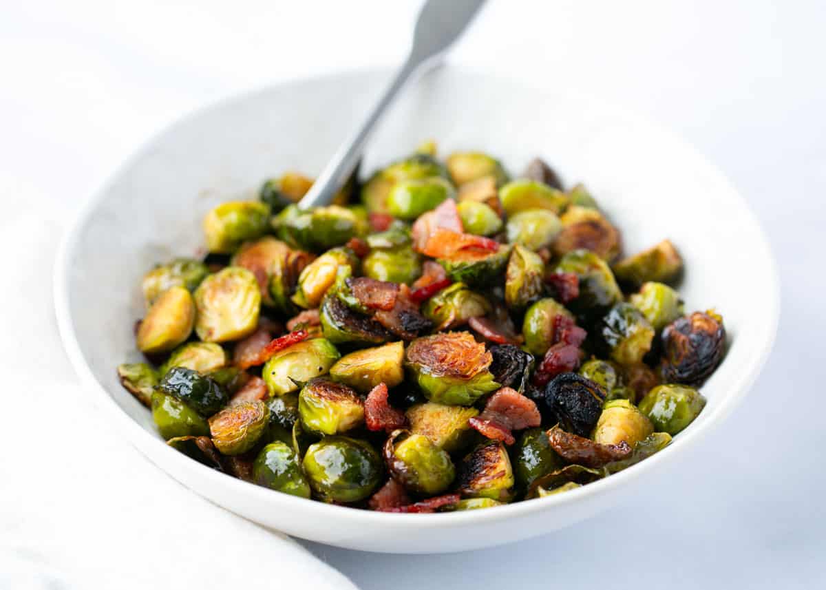 Brussel sprouts with bacon in a bowl.