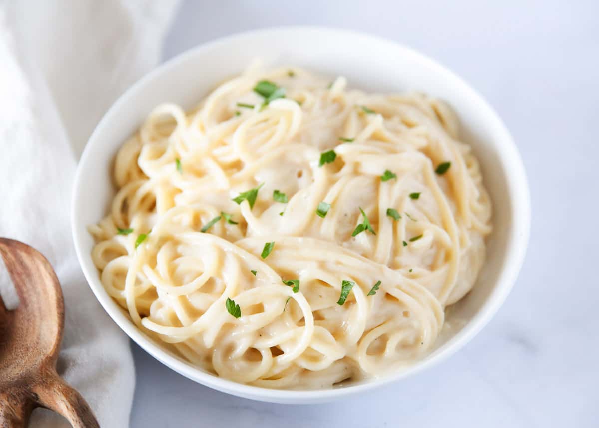 White sauce pasta in a bowl.