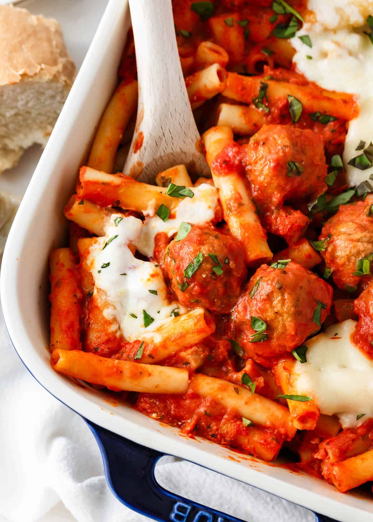 Spoonful on baked ziti with meatballs.
