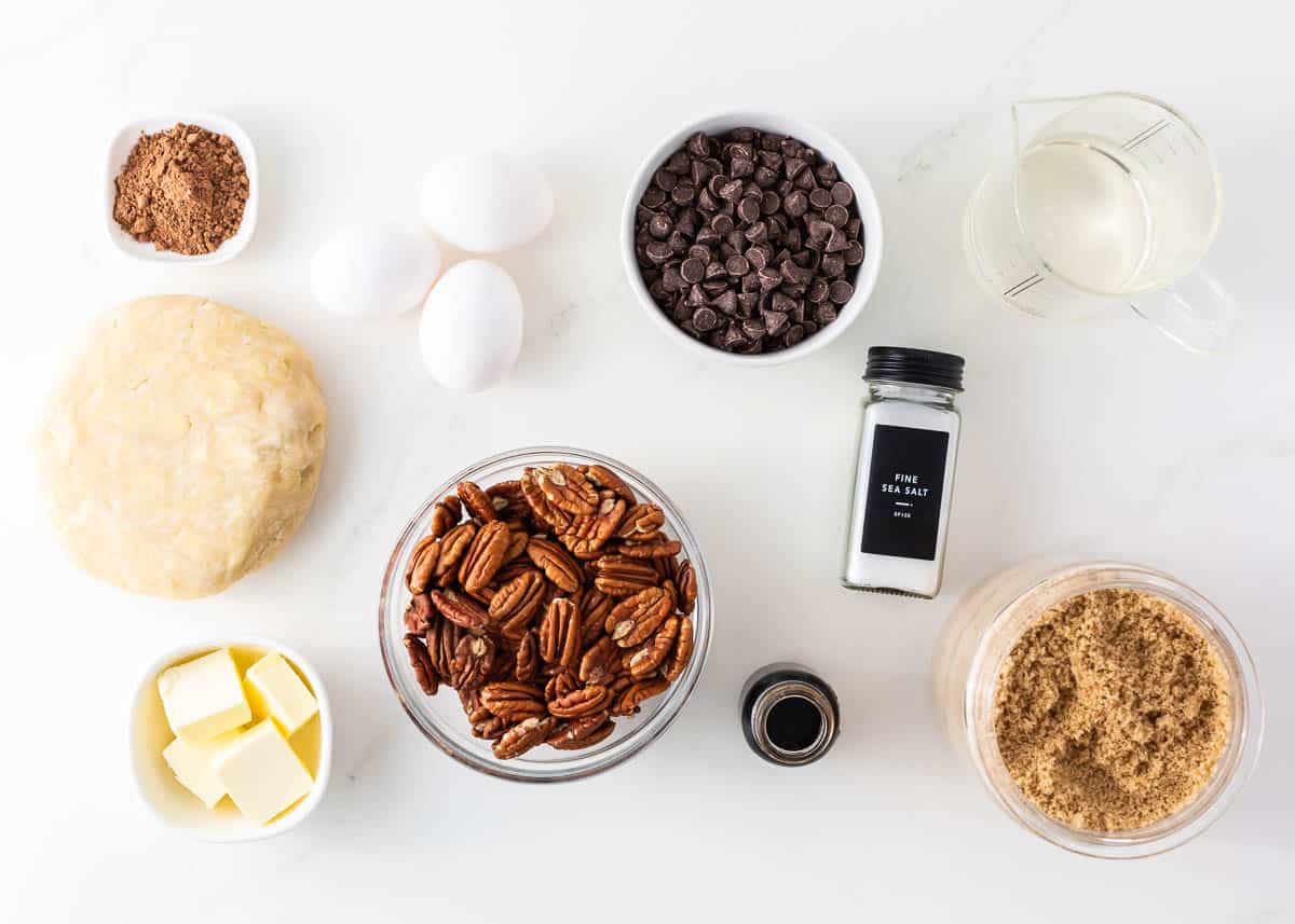 Chocolate pecan pie ingredients on the counter.