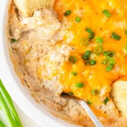 Spoonful of crab dip in pan.