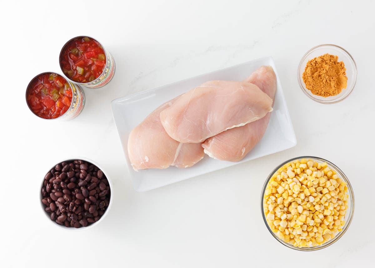 Crockpot Mexican chicken ingredients on the counter.