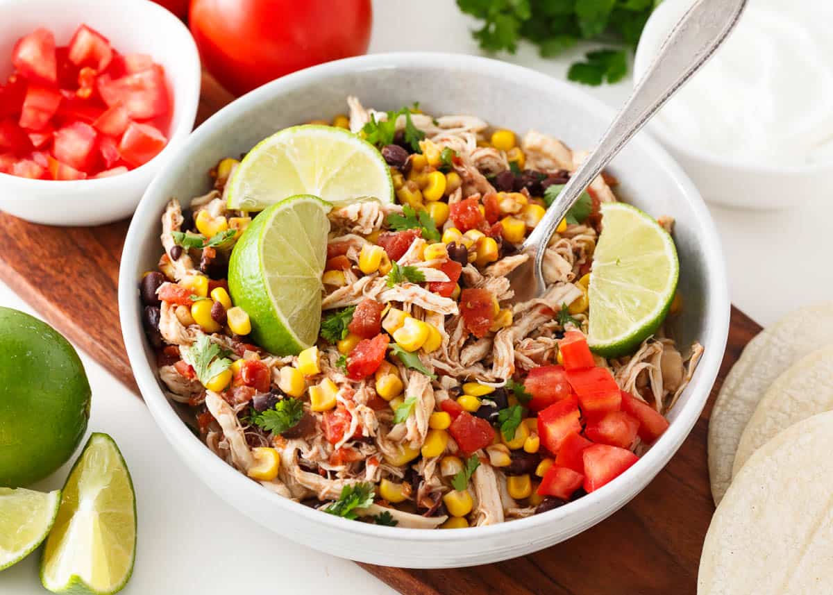 Crockpot Mexican chicken in a bowl. 