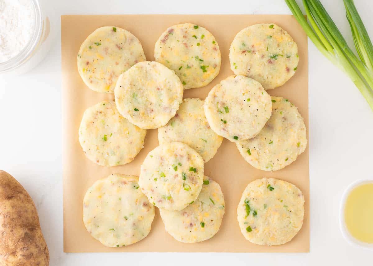 Showing how to make potato pancakes. 