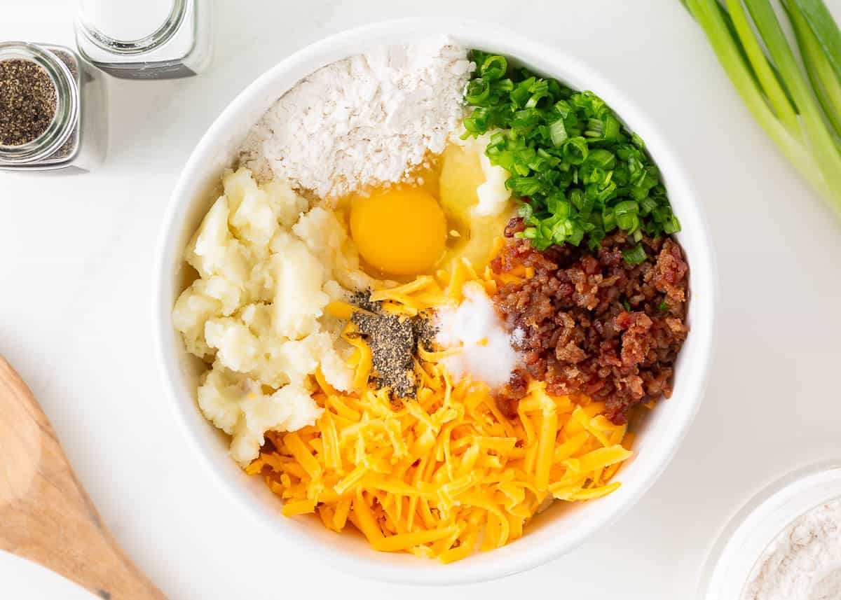 Mashed potato pancake ingredients in a bowl. 