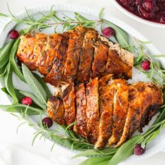 Sliced turkey breast on a platter.