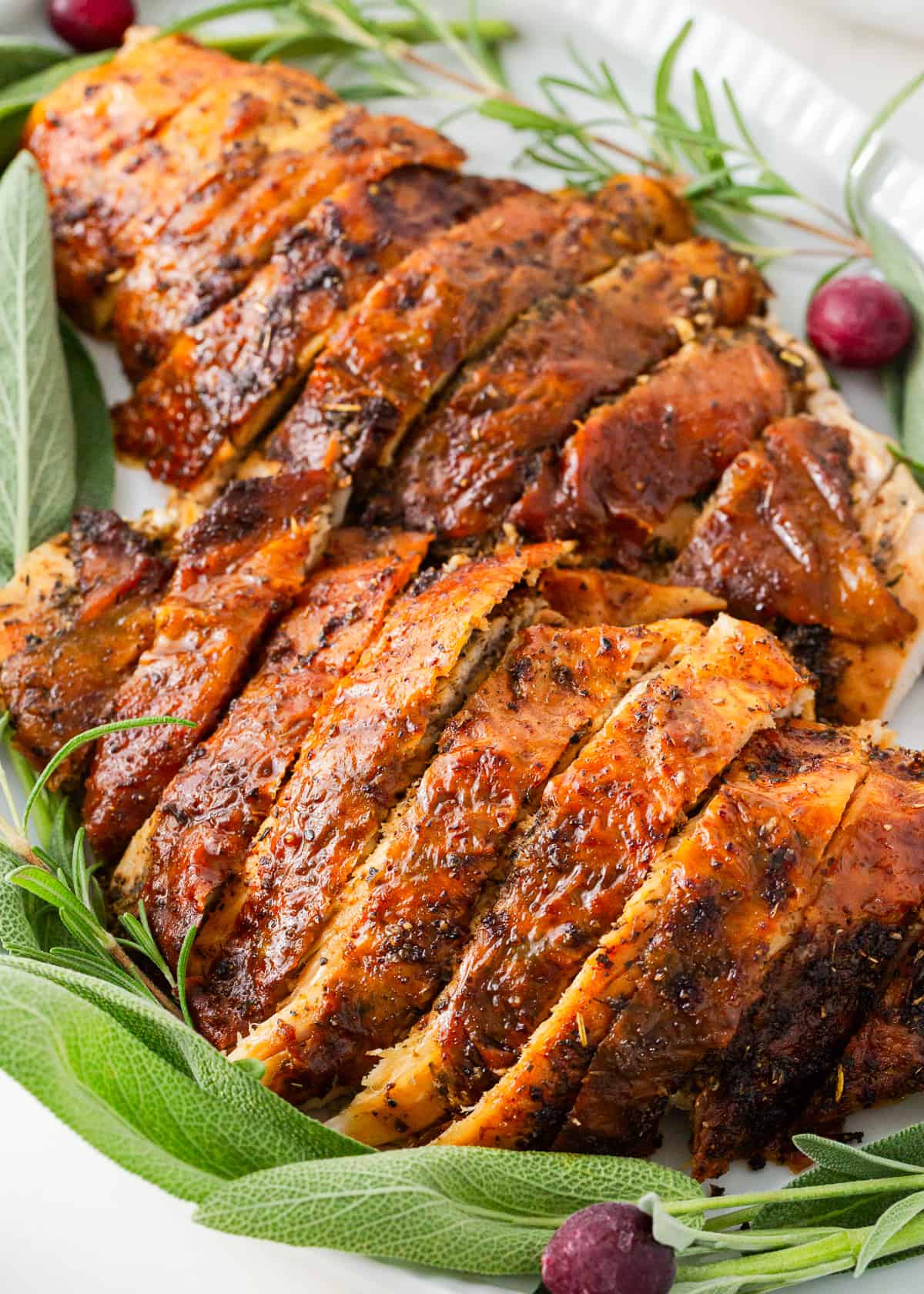 Sliced turkey breast on a plate.