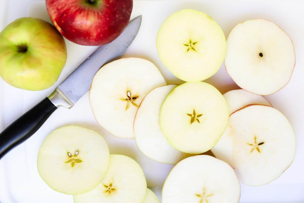 Sliced apples on a cutting board. 