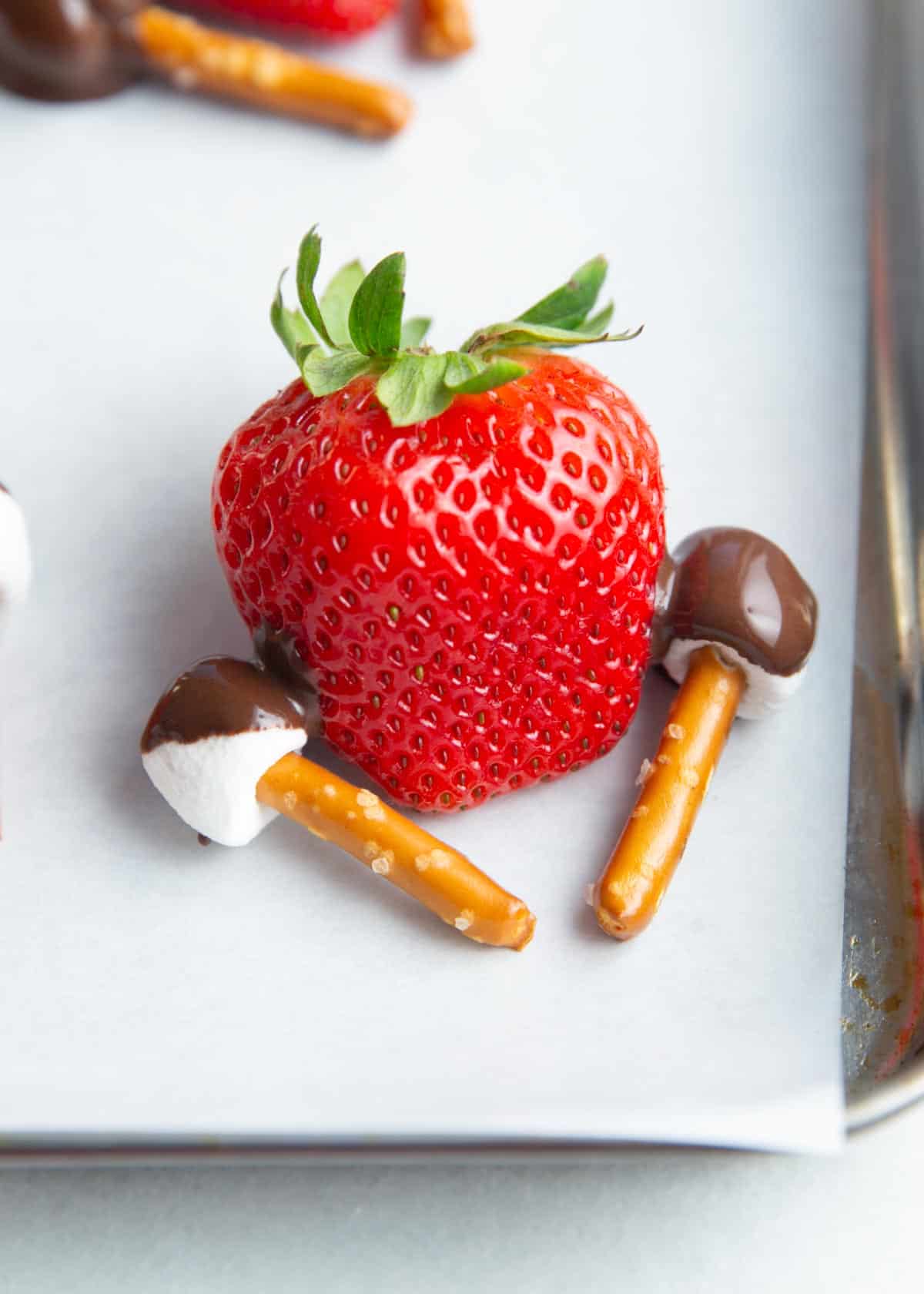 Making chocolate covered strawberry turkeys.