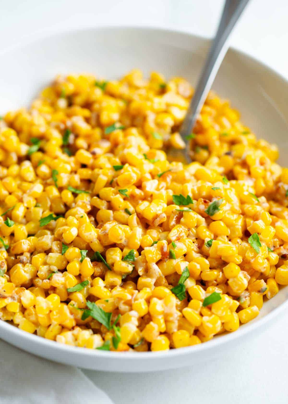 Corn in a white bowl.