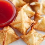 Cream cheese wontons with sweet and sour sauce.