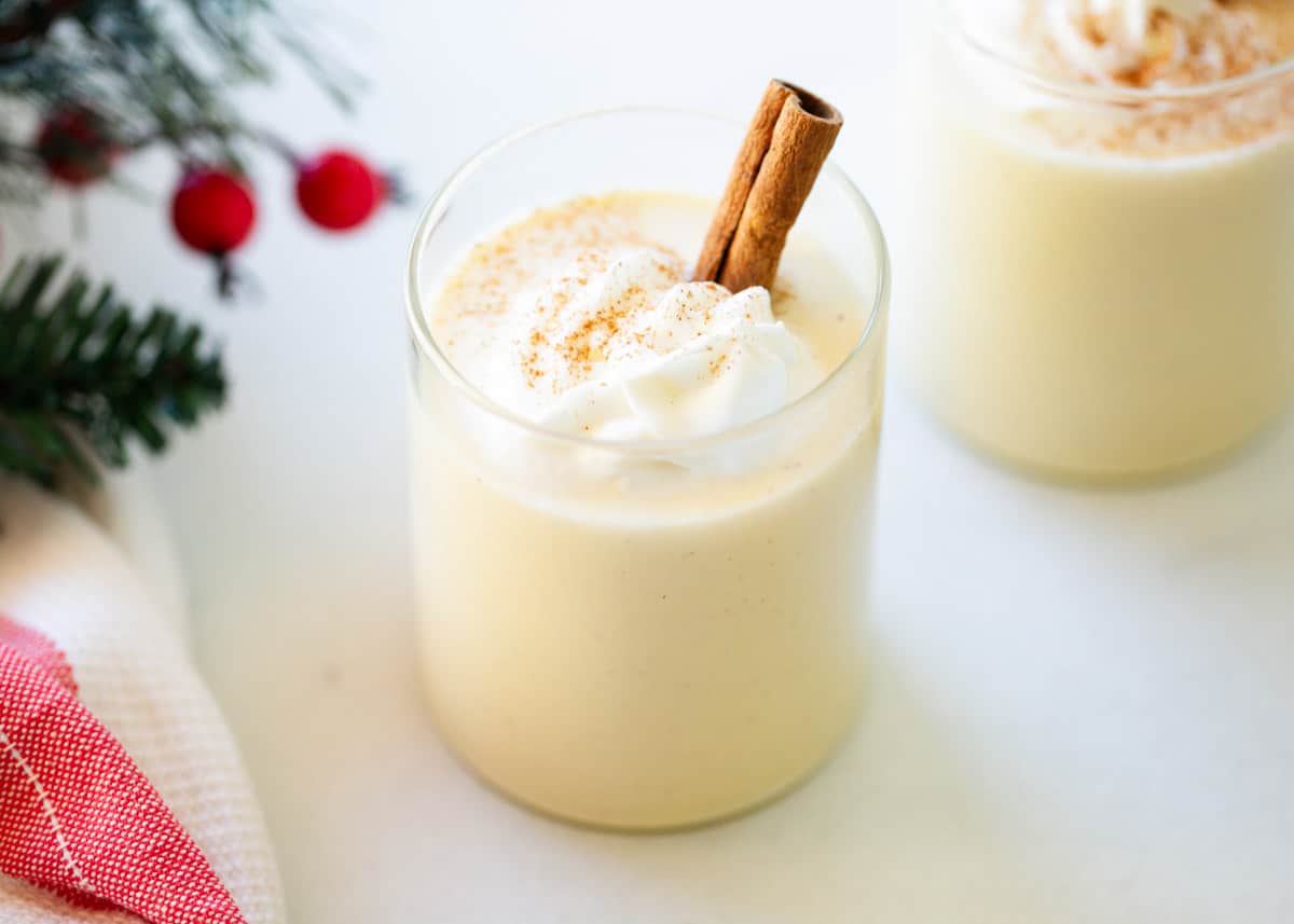 Eggnog in a glass cup.