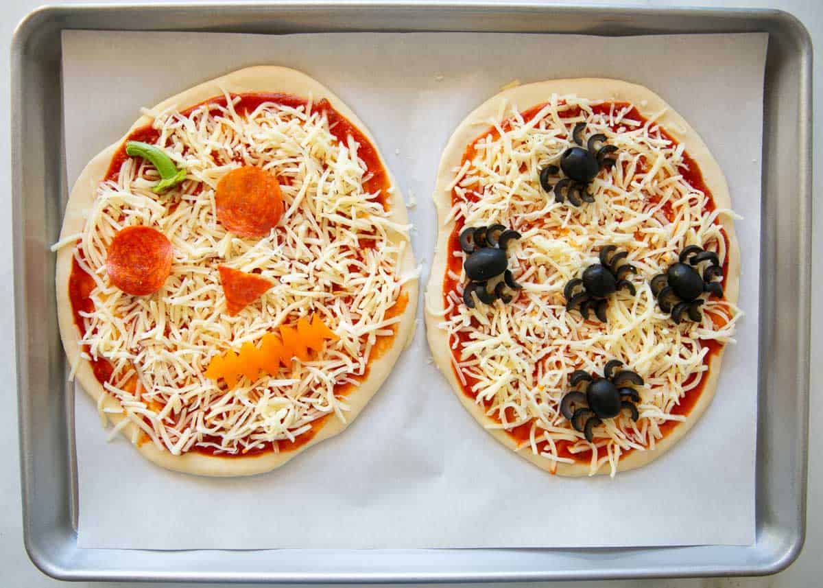 Showing how to make Halloween pizza.