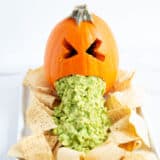 Puking pumpkin with tortilla chips.