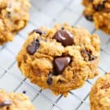 Pumpkin oatmeal chocolate chip cookies on cooling rack.