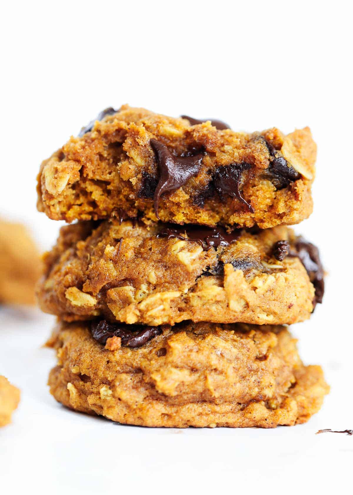 Stack of pumpkin oatmeal chocolate chip cookies.