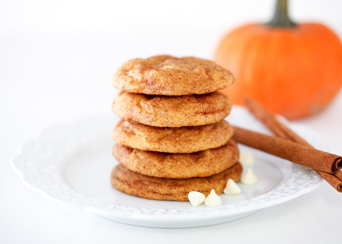 Pumpkin snickerdoodles on a white plate.