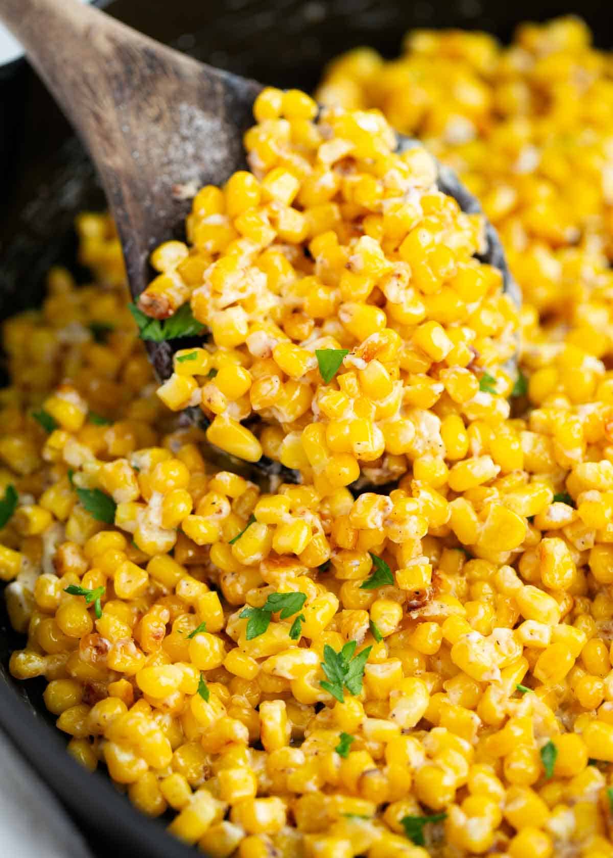 Cooking corn in an iron skillet.