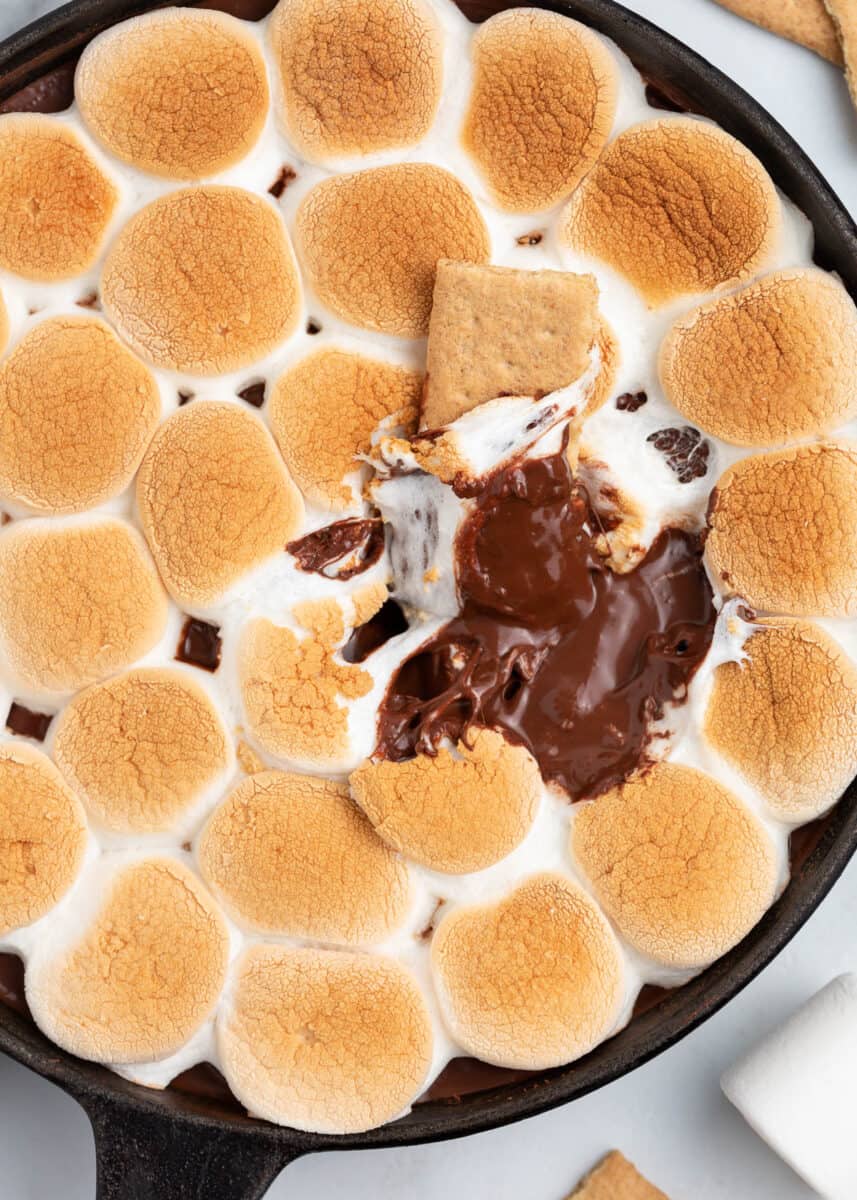 Smores dip cooked in a iron skillet.