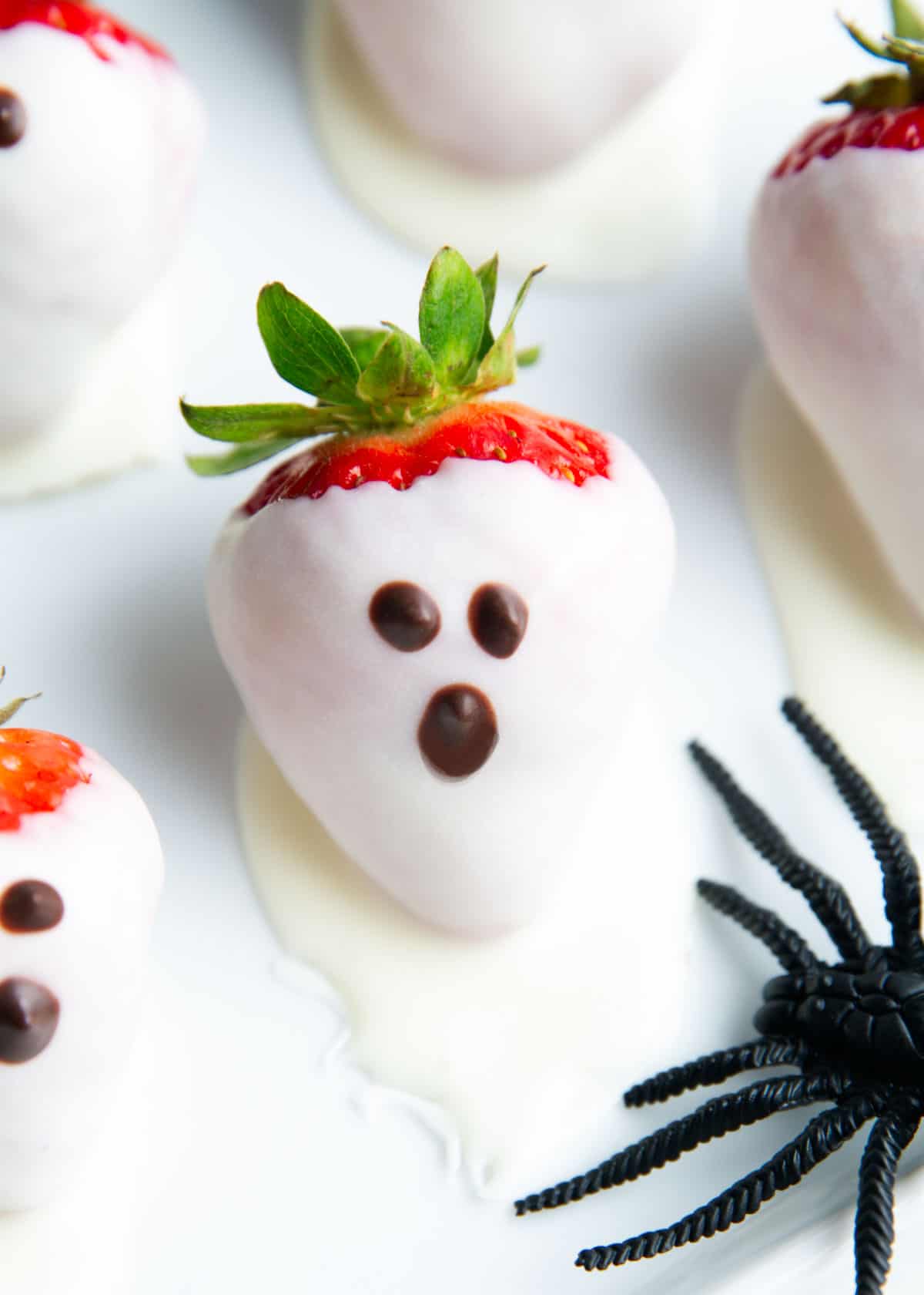 Strawberry ghosts on a plate.