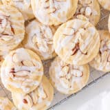 Almond cookies on a cooling rack.