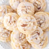 Almond cookies on a white plate.